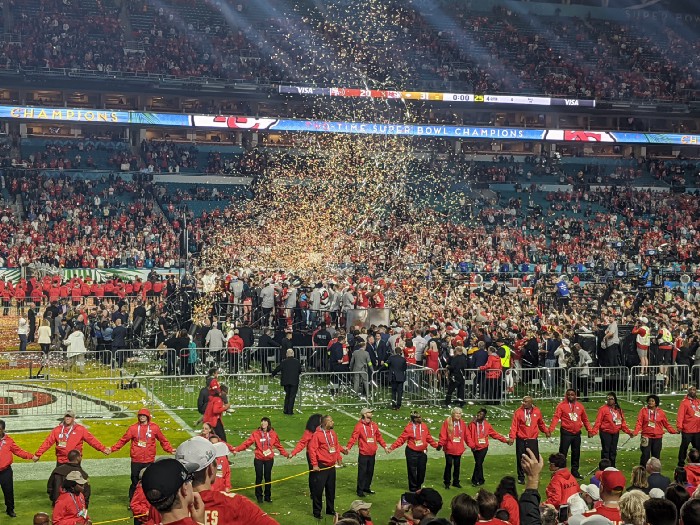 Image shows celebration on the football field of Superbowl fifty-four in 2020
